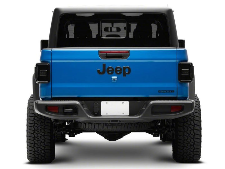 Raxiom 20-23 Jeep Gladiator JT w/ Factory Halogen LED Tail Lights- Black Housing (Smoked Lens)