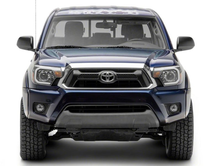 Raxiom 12-15 Toyota Tacoma Axial Projector Headlights w/ SEQL LED Bar- Black Housing (Clear Lens)