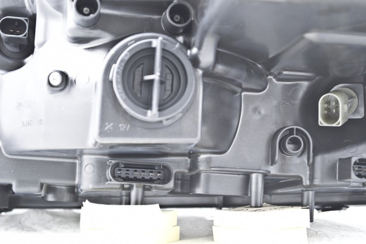 Hella 2008-2008 Mercedes-Benz ML320 Headlight Assembly