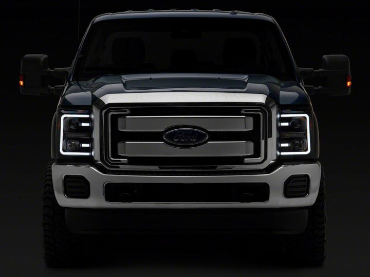 Raxiom 11-16 Ford F-250 Super Duty LED Projector Headlights - Black Housing (Clear Lens)
