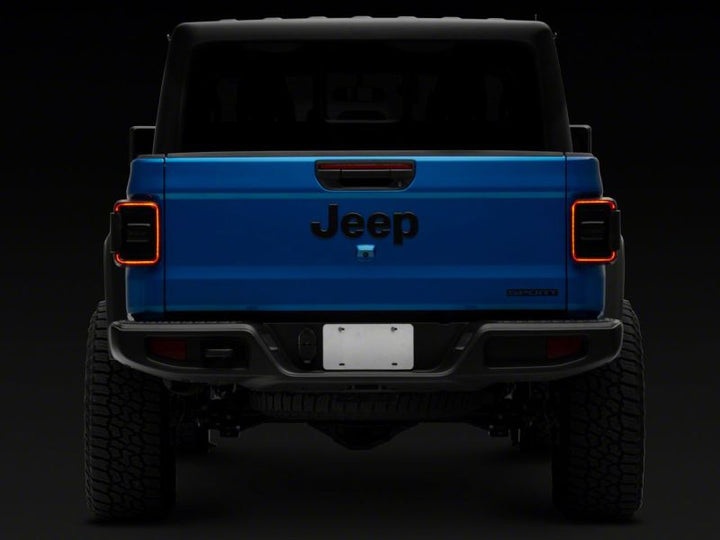Raxiom 20-23 Jeep Gladiator JT w/ Factory Halogen LED Tail Lights- Black Housing (Smoked Lens)