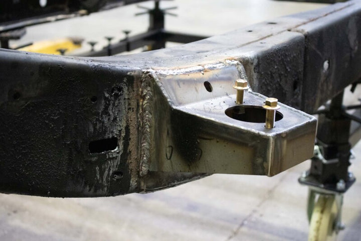 RustBust 05-15 Toyota Tacoma Access Cab and Crew Cab Front Body Mount Left