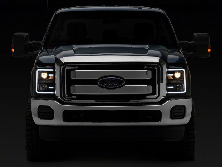 Raxiom 11-16 Ford F-250 Super Duty LED Projector Headlights - Black Housing (Clear Lens)