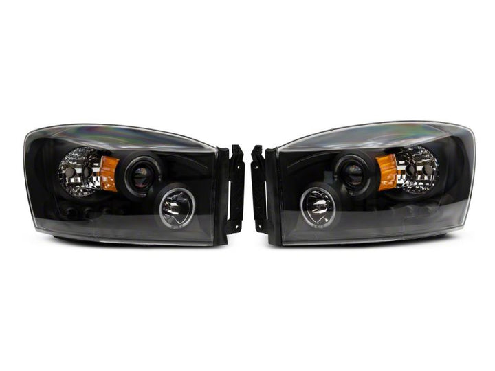 Raxiom 06-08 Dodge RAM 1500 LED Halo Projector Headlights- Black Housing (Clear Lens)