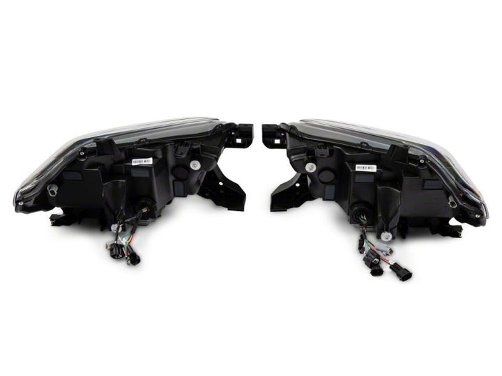 Raxiom 16-23 Toyota Tacoma w/ Factory Halogen DRL LED Headlights- Black Housing (Clear Lens)