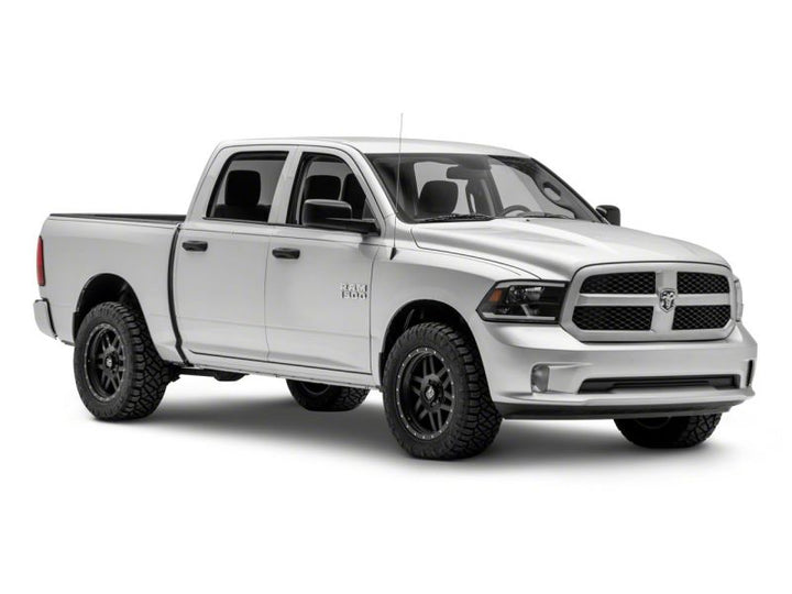Raxiom 09-18 Dodge RAM 1500/2500/3500 Axial Series Headlights w/ LED Bar- Black Housing (Clear Lens)