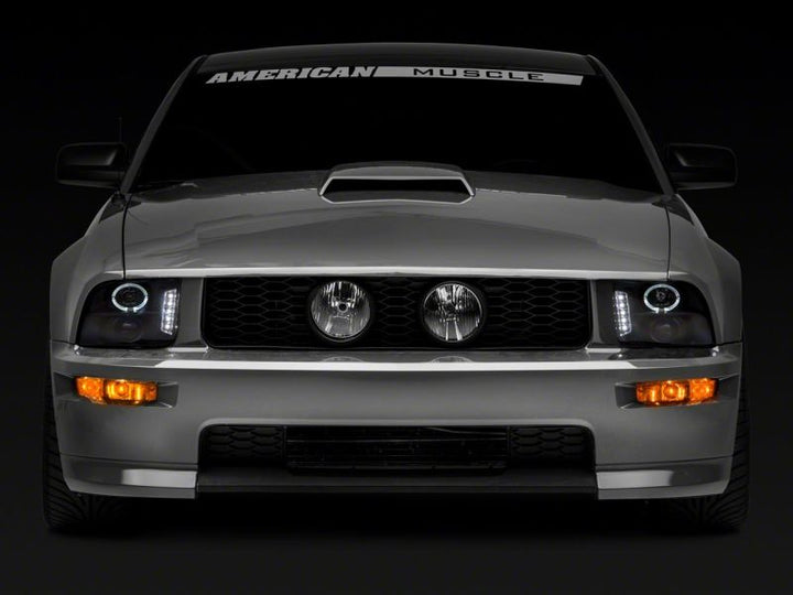 Raxiom 05-09 Ford Mustang Excluding GT500 LED Halo Projector Headlights- Black Housing (Clear Lens)