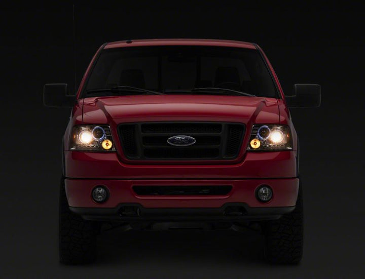 Raxiom 04-08 Ford F-150 Dual LED Halo Projector Headlights- Chrome Housing (Clear Lens)