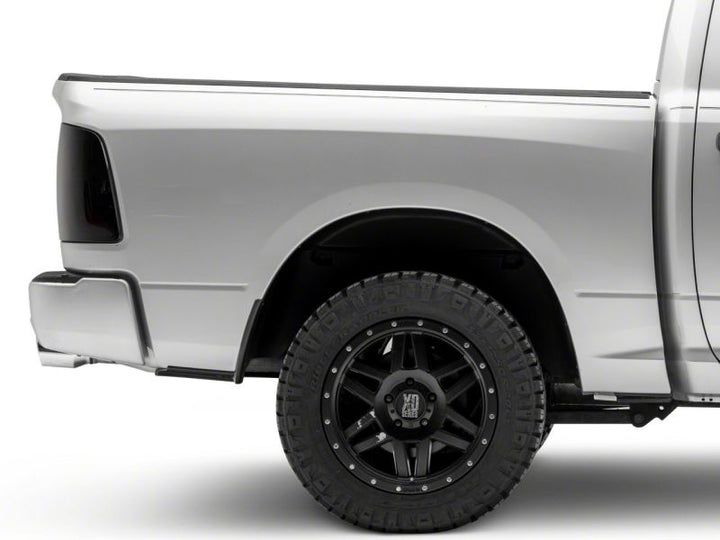 Raxiom 09-18 Dodge RAM 1500/2500/3500 Axial Series LED Tail Lights- Black Housing (Smoked Lens)