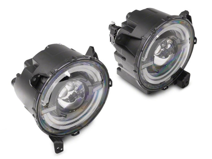 Raxiom 18-23 Jeep Wrangler JL Axial Series 9-In LED Angel Eye Headlights- Black Housing (Clear Lens)