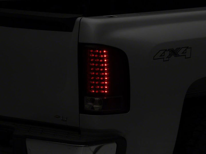 Raxiom 07-13 Chevrolet Silverado 1500 LED Tail Lights- Black Housing (Clear Lens)