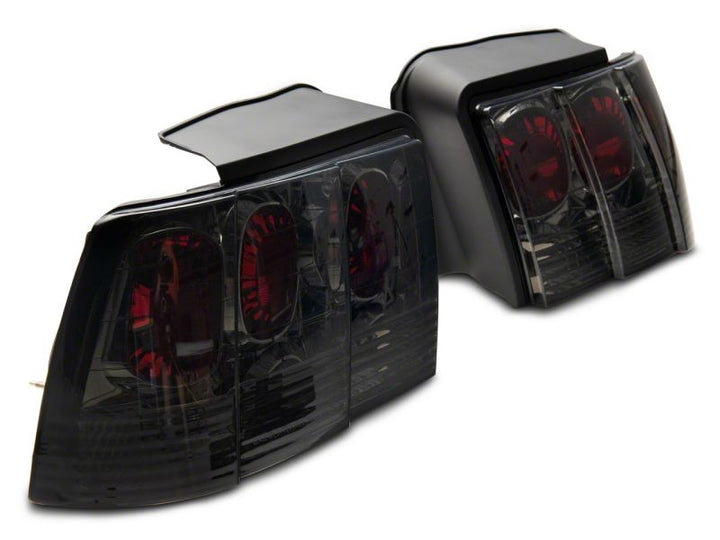 Raxiom 99-04 Ford Mustang Axial Series Altezza Style Tail Lights- Black Housing (Smoked Lens)