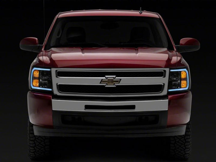 Raxiom 07-13 Chevrolet Silverado 1500 Axial Series Headlights w/ LED Bar- Black Housing (Clear Lens)