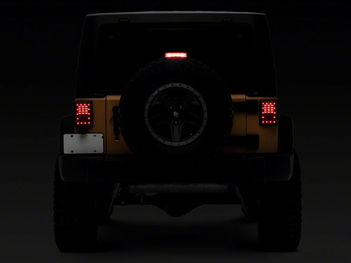 Raxiom 07-18 Jeep Wrangler JK Axial Series LED Tail Lights- Black Housing (Clear Lens)