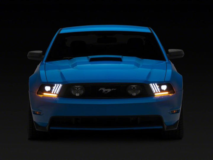 Raxiom 10-12 Ford Mustang LED Projector Headlights SEQL Turn Signals- Black Housing (Clear Lens)