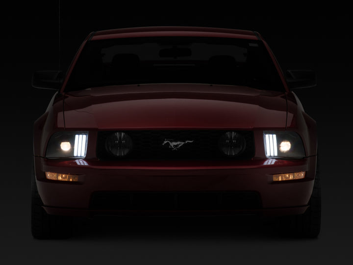 Raxiom 05-09 Ford Mustang w/ Halogen Projector Headlights- Black Housing (Clear Lens) (No GT500 )
