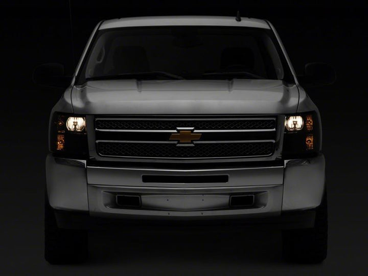 Raxiom 07-14 Chevrolet Silverado 1500 HD Axial OEM Rep Headlights- Chrome Housing- Smoked Lens