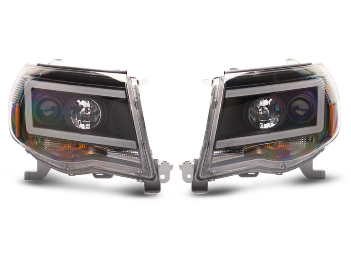 Raxiom 05-11 Toyota Tacoma Axial Series LED DRL Projector Headlights- Black Housing (Clear Lens)