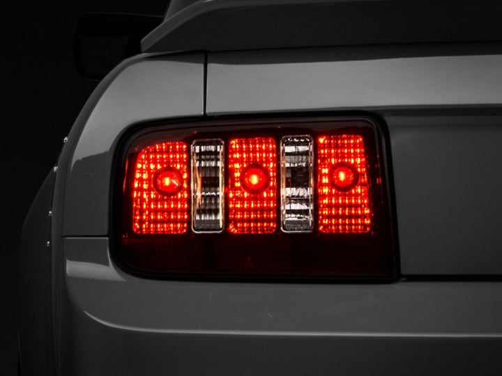 Raxiom 05-09 Ford Mustang Coyote Tail Lights- Black Housing (Smoked Lens)