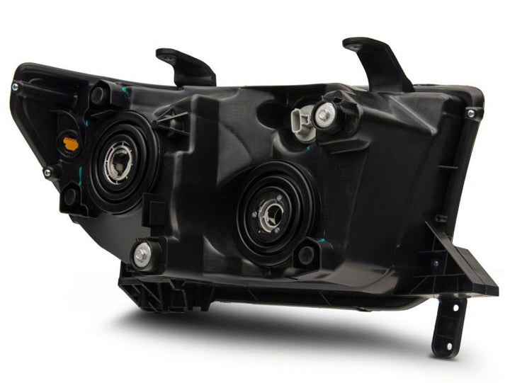 Raxiom 07-13 Toyota Tundra Axial Series Projector Headlights w/ LED Bar- Black Housing (Clear Lens)