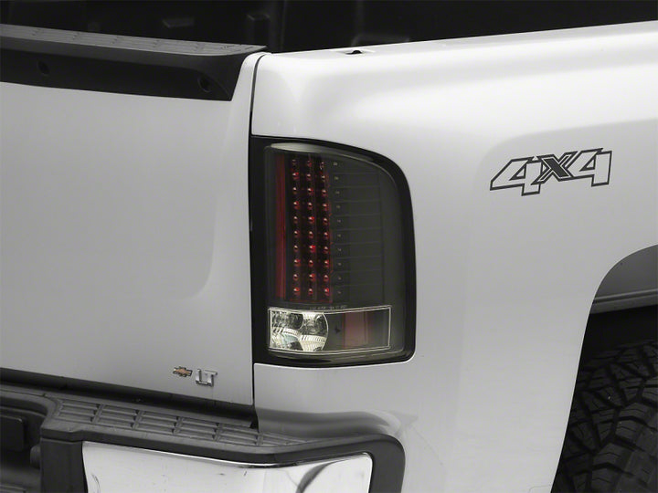 Raxiom 07-13 Chevrolet Silverado 1500 LED Tail Lights- Black Housing (Clear Lens)