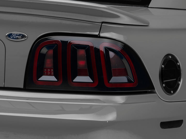 Raxiom 96-98 Ford Mustang Icon LED Tail Lights- Black Housing (Smoked Lens)