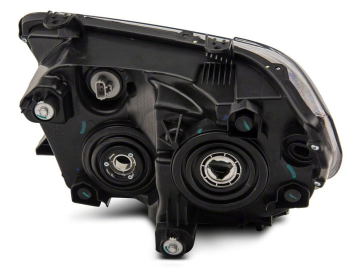 Raxiom 07-13 Toyota Tundra Axial Projector Headlights w/ SEQL LED Bar- Black Housing (Clear Lens)