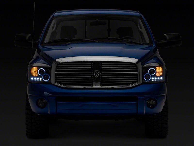 Raxiom 06-08 Dodge RAM 1500 LED Halo Projector Headlights- Black Housing (Clear Lens)