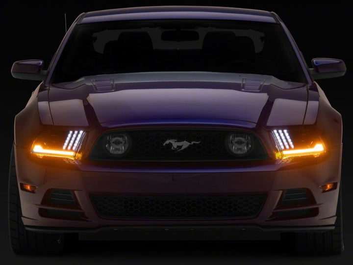 Raxiom 13-14 Ford Mustang LED Projector Headlights SEQL Turn Signals- Black Housing (Clear Lens)