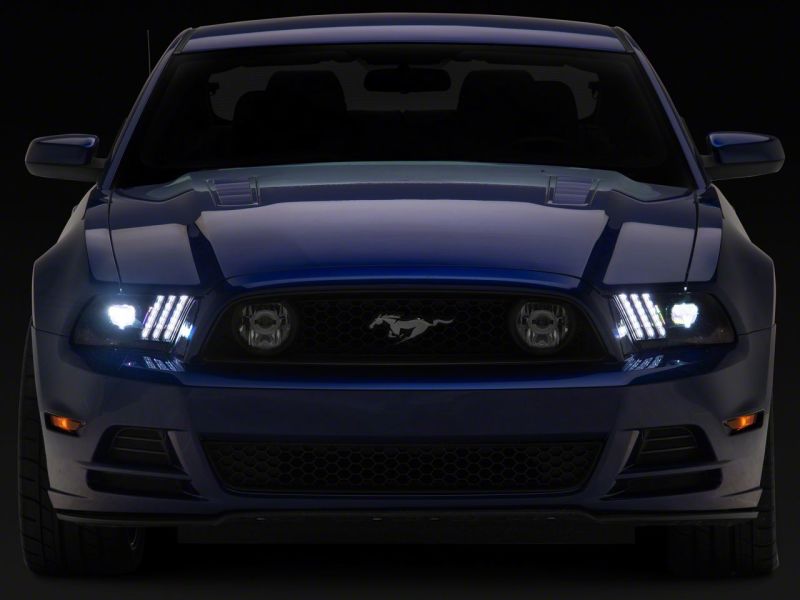 Raxiom 13-14 Ford Mustang LED Projector Headlights SEQL Turn Signals- Black Housing (Clear Lens)
