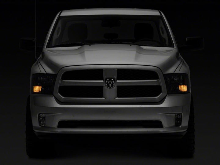 Raxiom 09-18 Dodge RAM 1500 Axial Series Euro Style Headlights w/ Dual Bulb Blk Housing (Clear Lens)