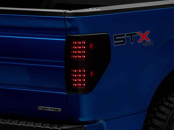 Raxiom 09-14 Ford F-150 Styleside Axial Series LED Tail Lights- Black Housing (Smoked Lens)