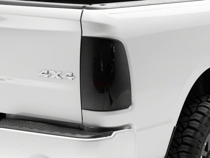 Raxiom 09-18 Dodge RAM 1500/2500/3500 Axial Series LED Tail Lights- Black Housing- Smoked Lens
