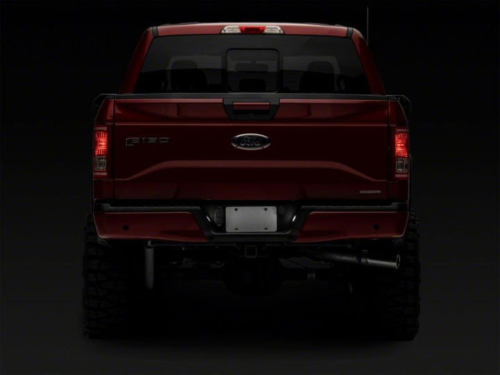 Raxiom 07-14 Ford F-150 Axial Series LED License Plate Lamps- Smoked