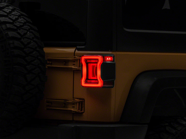 Raxiom 07-18 Jeep Wrangler JK Axial Series JL Style LED Tail Lights- Black Housing- Red Lens