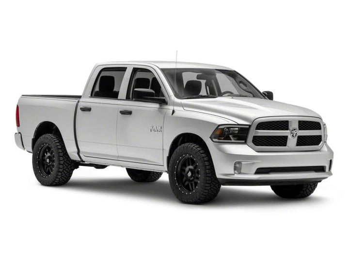 Raxiom 09-18 Dodge RAM 1500/2500/3500 Axial Headlights w/ SEQL LED Bar- Black Housing (Clear Lens)