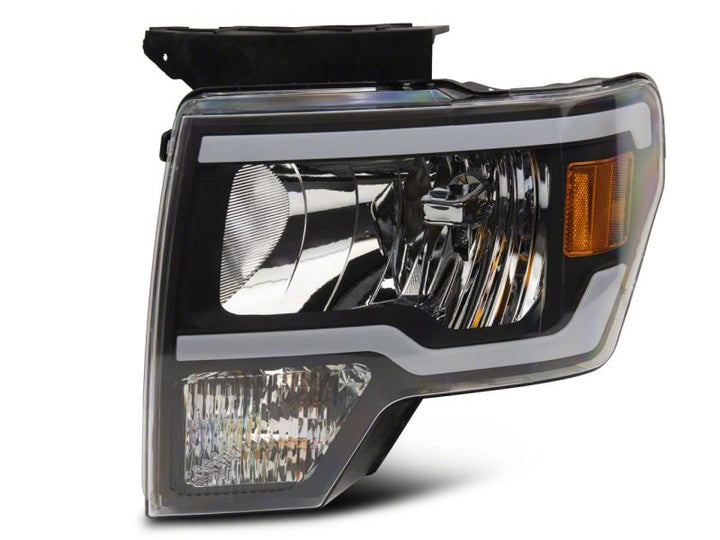 Raxiom 09-14 Ford F-150 Axial Series Headlight w/ SEQL LED Bar- Black Housing (Clear Lens)