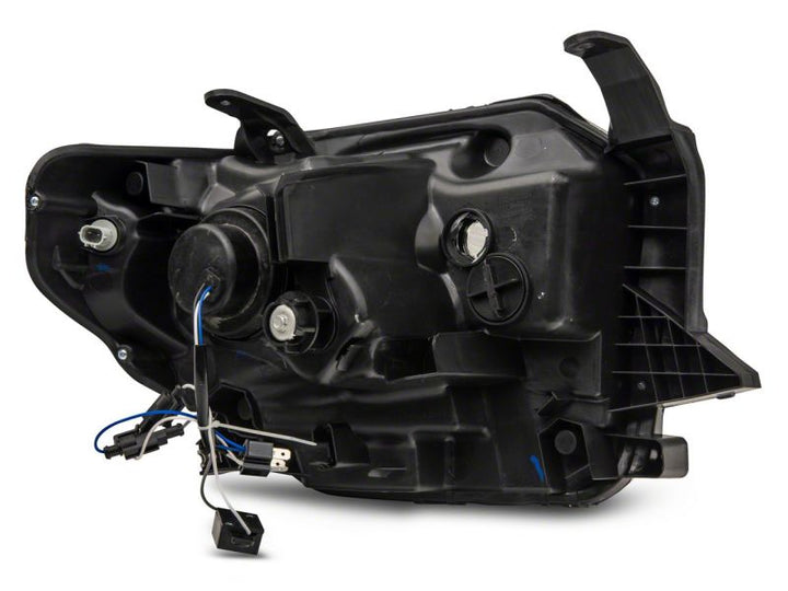 Raxiom 14-21 Toyota Tundra Axial Series Projector Headlights w/ LED Bar- Black Housing (Clear Lens)