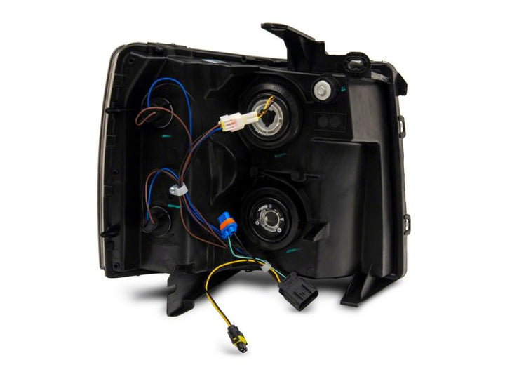 Raxiom 07-13 Chevrolet Silverado 1500 Axial Headlights w/ SEQL LED Bar- Black Housing (Clear Lens)