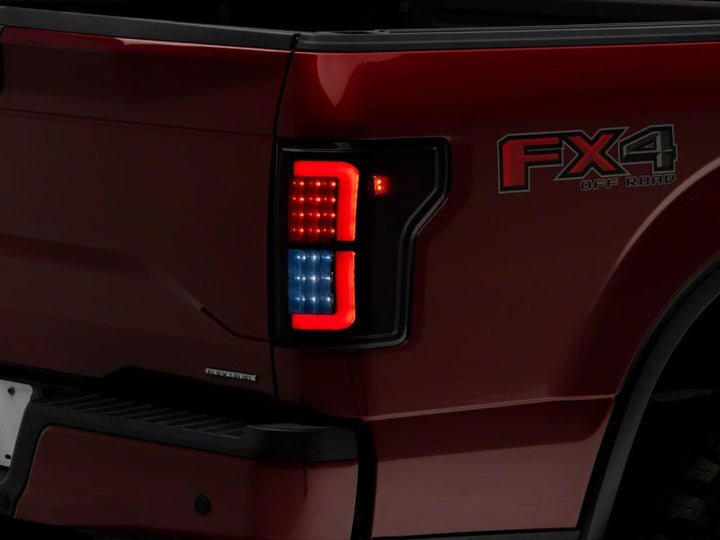 Raxiom 15-17 Ford F-150 Axial Series LED Tail Lights- Black Housing (Smoked Lens)