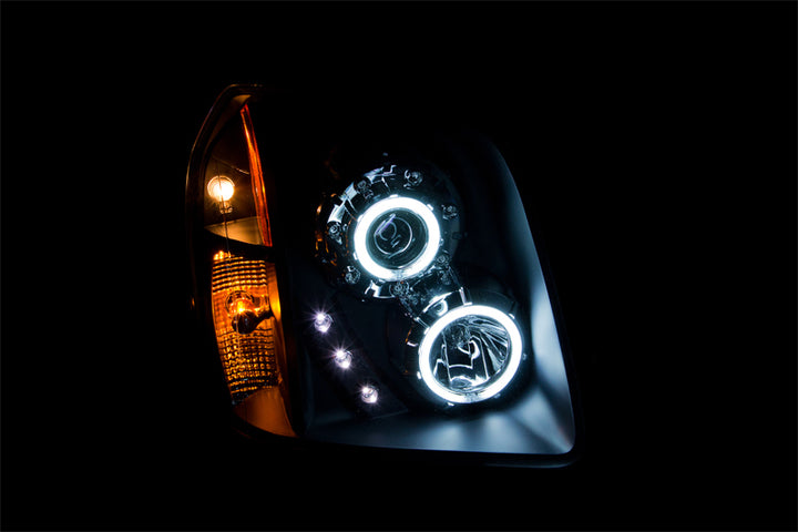 ANZO 2007-2014 GMC Yukon Projector Headlights w/ Halo Black (CCFL)