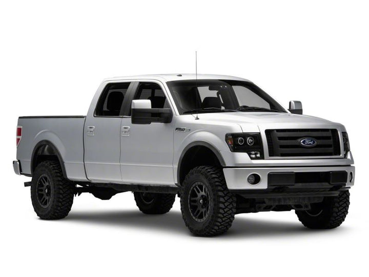 Raxiom 09-14 Ford F-150 Super White LED Halo Projector Headlights- Black Housing (Clear Lens)