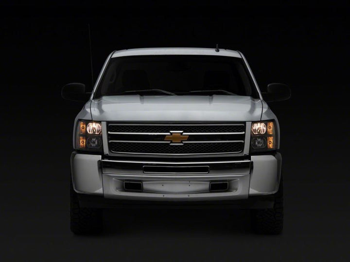 Raxiom 07-13 Chevrolet Silverado 1500 Euro Headlights- Black Housing (Clear Lens)