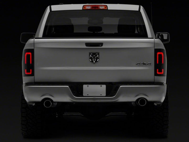 Raxiom 09-18 Dodge RAM 1500/2500/3500 Axial Series LED Tail Lights- Black Housing (Smoked Lens)
