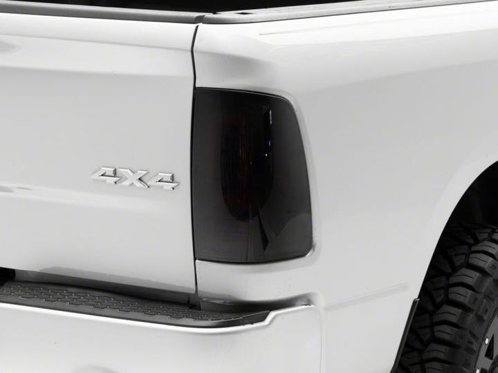 Raxiom 09-18 Dodge RAM 1500/2500/3500 Axial Series LED Tail Lights- Black Housing (Smoked Lens)