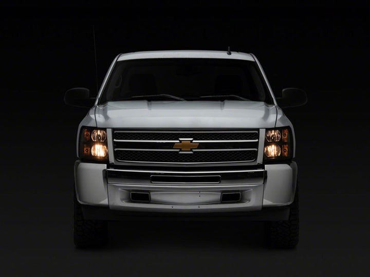 Raxiom 07-13 Chevrolet Silverado 1500 Euro Headlights- Black Housing (Clear Lens)