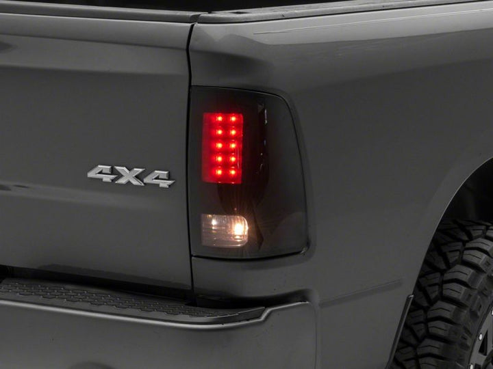 Raxiom 09-18 Dodge RAM 1500/2500/3500 Axial Series LED Tail Lights- Black Housing- Smoked Lens