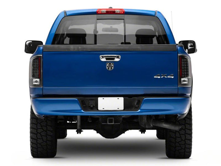 Raxiom 07-08 Dodge RAM 1500 LED Tail Lights- Black Housing (Clear Lens)