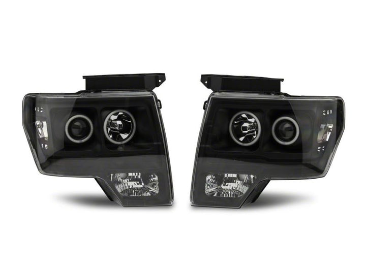 Raxiom 09-14 Ford F-150 Super White LED Halo Projector Headlights- Black Housing (Clear Lens)